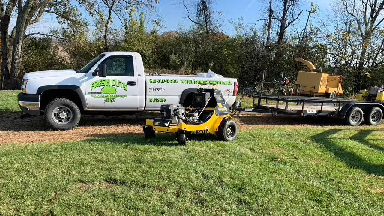 Fresh Cuts Lawn & Maintenance truck and trailer after a lawn care job in Fogelsville, PA.