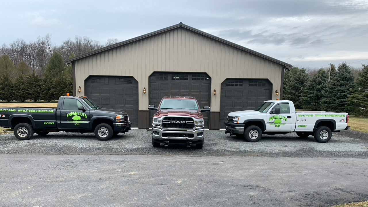 Fresh Cuts Lawn & Maintenance work trucks and equipment near Emmaus, PA.