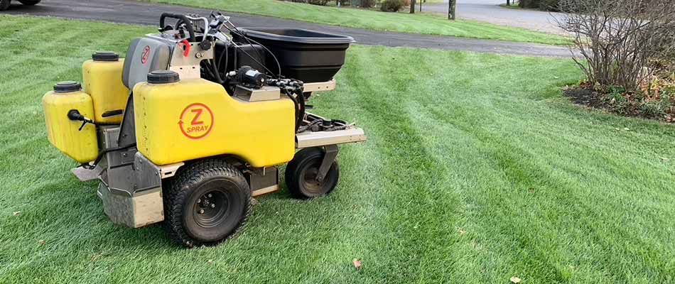 Lawn fertilization equipment after fertilizer treatments applied in Fogelsville, Pennsylvania.