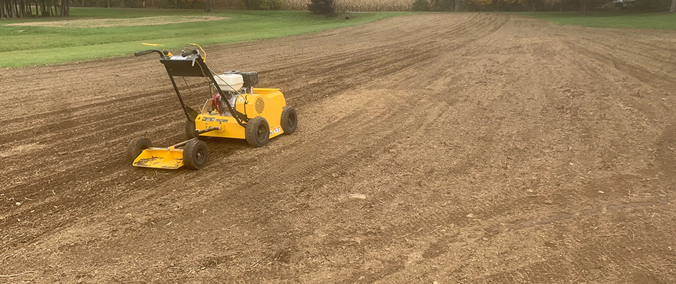 Slice seeding machine in graded land in Allentown, PA.