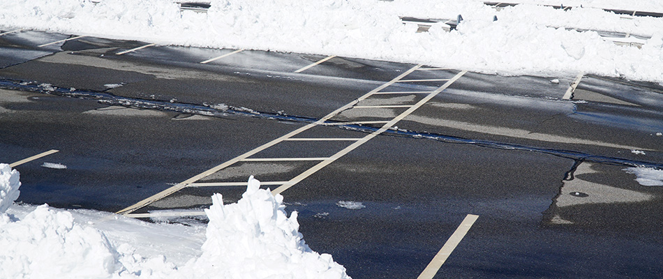 Snow piles after parking lot has been cleared by professionals in Allentown, PA.